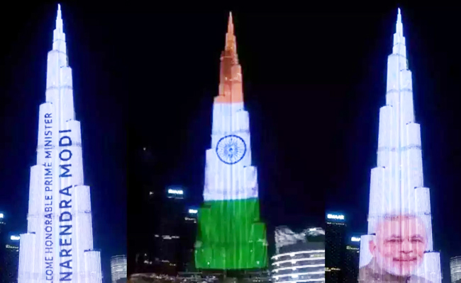 Burj Khalifa Lit Up With Indian Tricolour And Modis Name - Sakshi