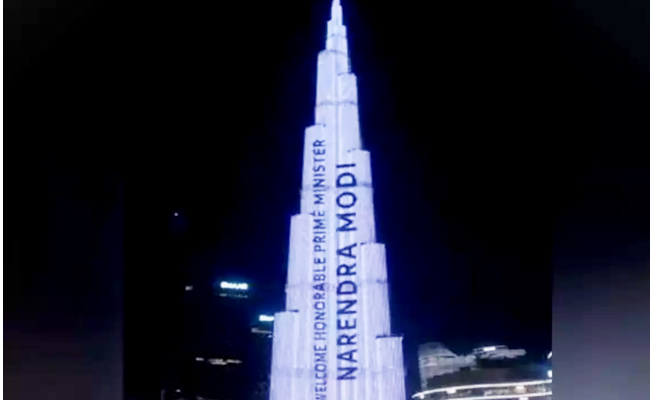 Burj Khalifa Lit Up With Indian Tricolour And Modis Name - Sakshi