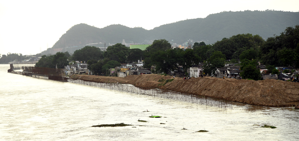 Andhra Pradesh: Huge inflows reported at Prakasam Barrage Photos - Sakshi