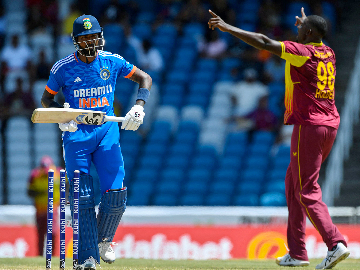 west Indies beat India by 4 runs in 1st T20 Photos - Sakshi