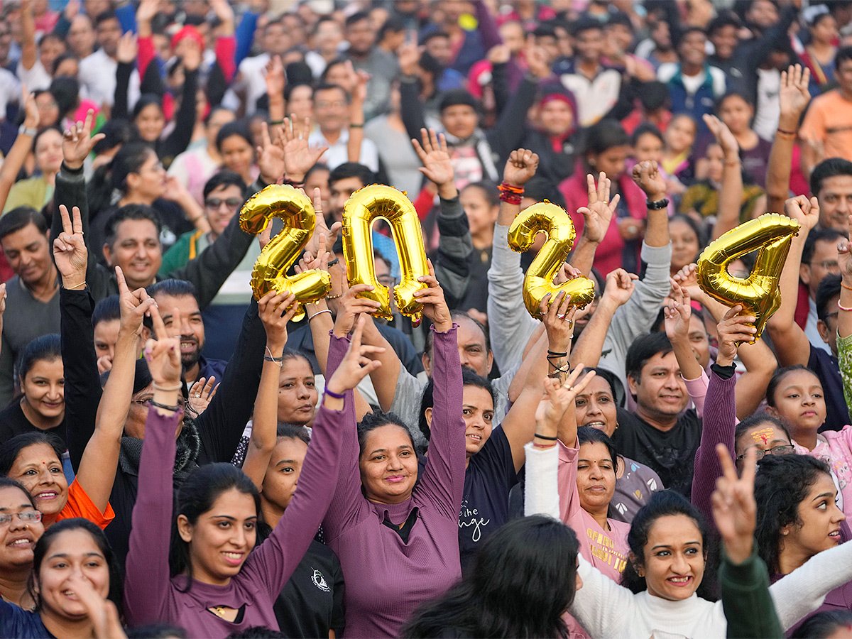 People Celebrated New Year 2024 In Their Unique Way - Sakshi