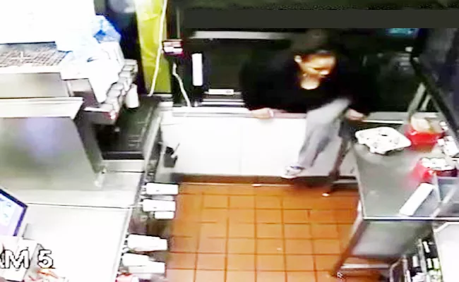 women thief at McDonalds video goes viral - Sakshi - Sakshi