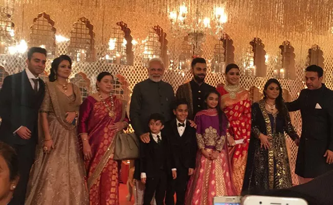 Narendra Modi attends Virat, Anushka wedding reception - Sakshi