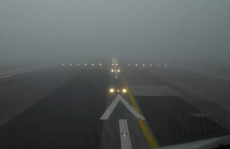 foggy weather obstructs planes - Sakshi