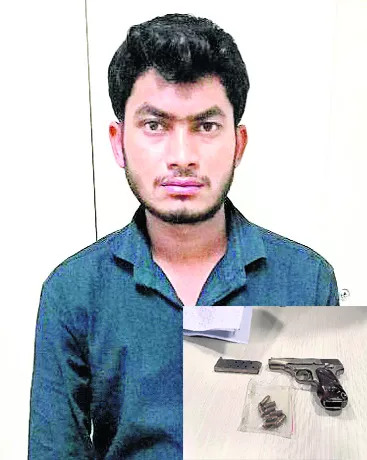Man Held With Pistol at Uppal Metro Station - Sakshi