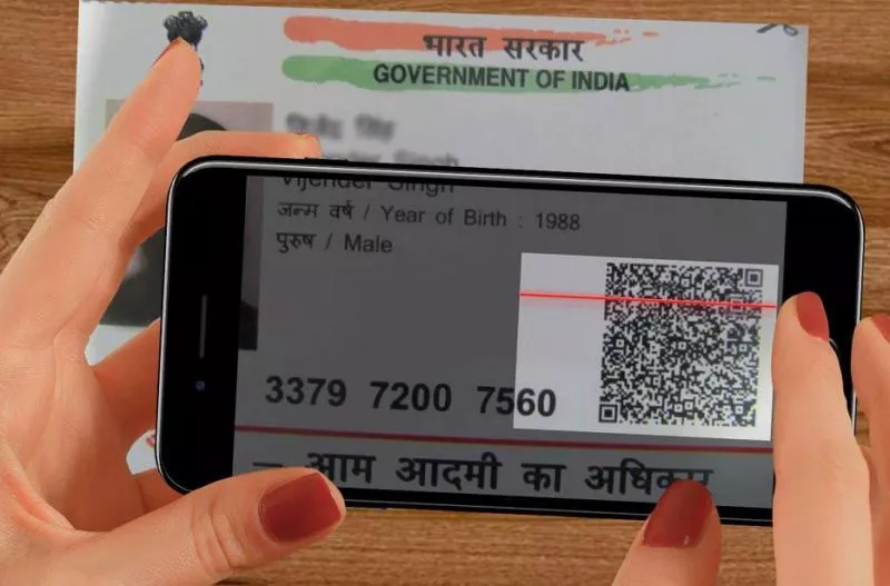 Digitally-signed QR code with photo for eAadhaar introduced - Sakshi