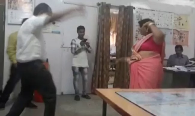 Two Suspended For Dancing in office in Madhya Pradesh - Sakshi