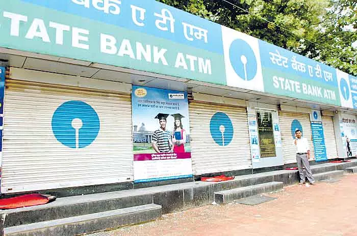 No cash boards that are running at ATMs - Sakshi