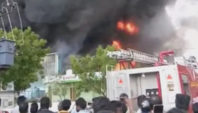 Massive Fire Accident At Autonagar In Vijayawada - Sakshi
