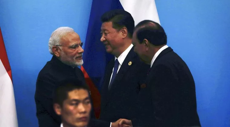  Modi, Mamnoon Hussain shake hands at SCO Summit - Sakshi