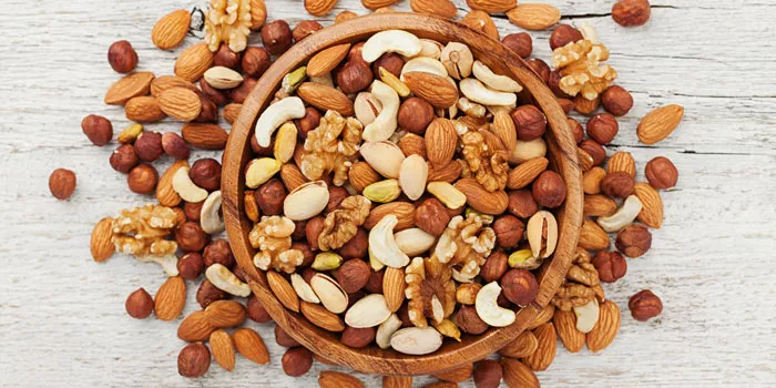 Eating nuts every day increases sperm production - Sakshi