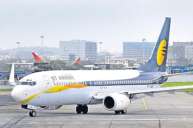 Govt said to have asked Tatas to explore Jet Airways bid - Sakshi