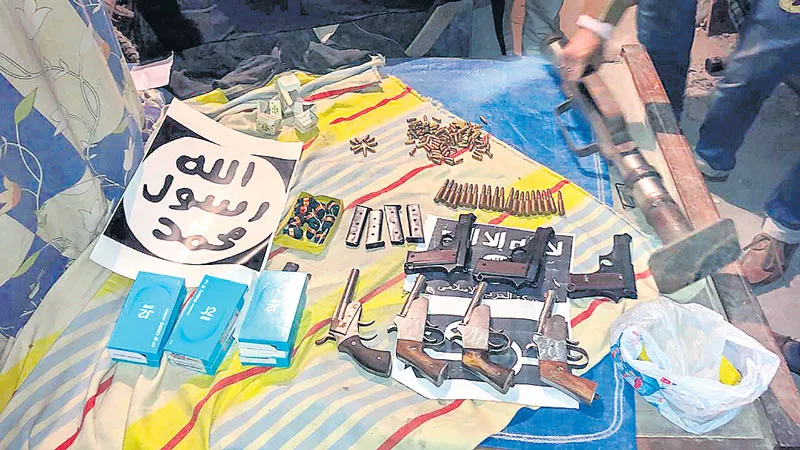 NIA raids in Delhi and UP at 16 locations recovers explosives, rocket launcher - Sakshi