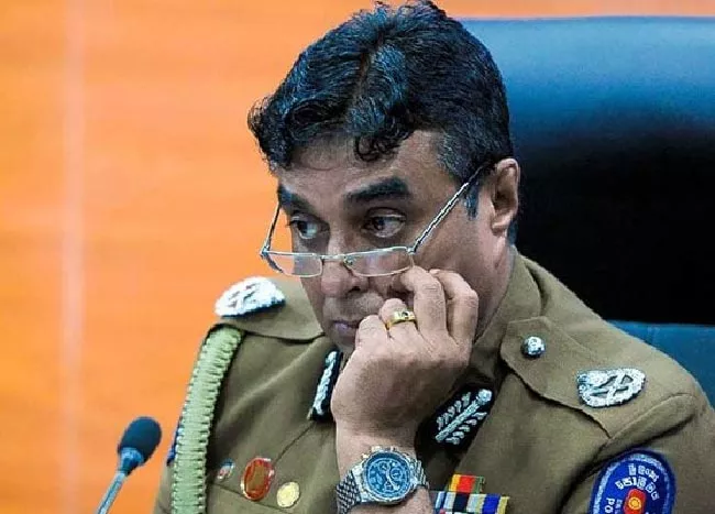 Sri Lanka suspends police chief over Easter attacks - Sakshi