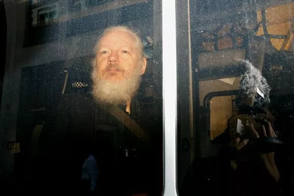 Julian Assange jailed for 50 weeks for Breaching UK Bail Conditions - Sakshi