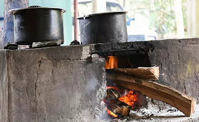 Pollution with Wood burning Stoves - Sakshi