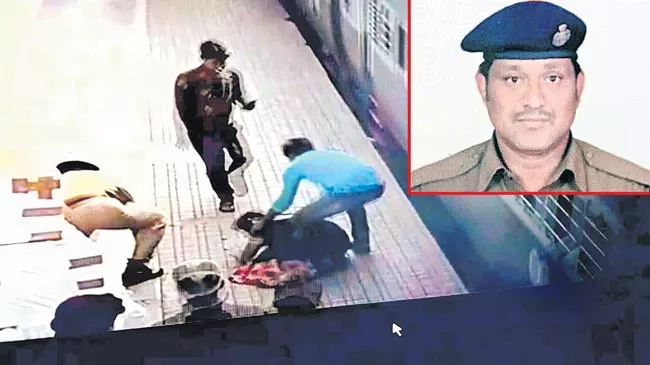 RPF constable saves life of woman from getting run over by train - Sakshi