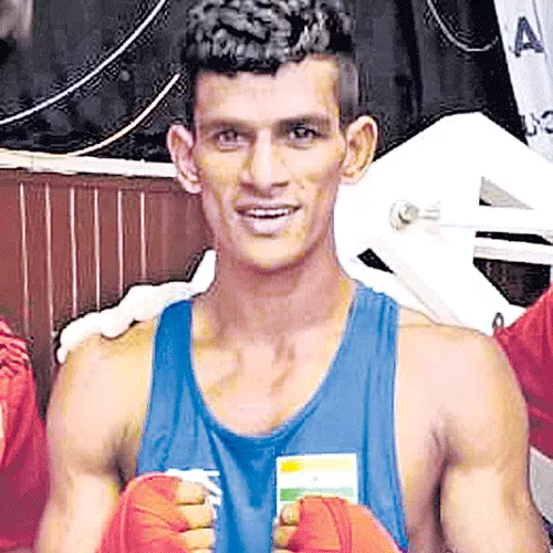 AP Boxer PL Prasad Ready To Fight For Gold - Sakshi