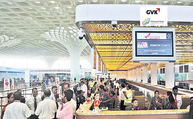 Adani Group to acquire 74percent stake in Mumbai International Airport - Sakshi