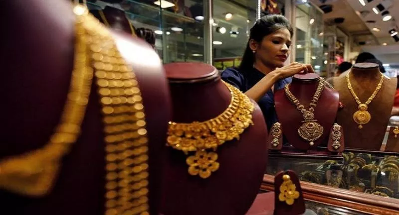 Gold and Silver prices up in MCX, New York Comex - Sakshi