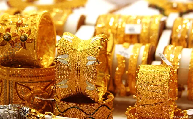 Gold, Silver prices jumps on stimulus, lock down news - Sakshi