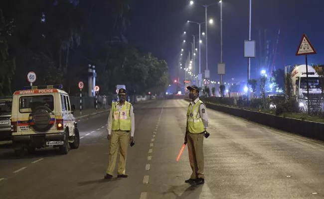 Karnataka and Maharashtra imposing night curfew - Sakshi