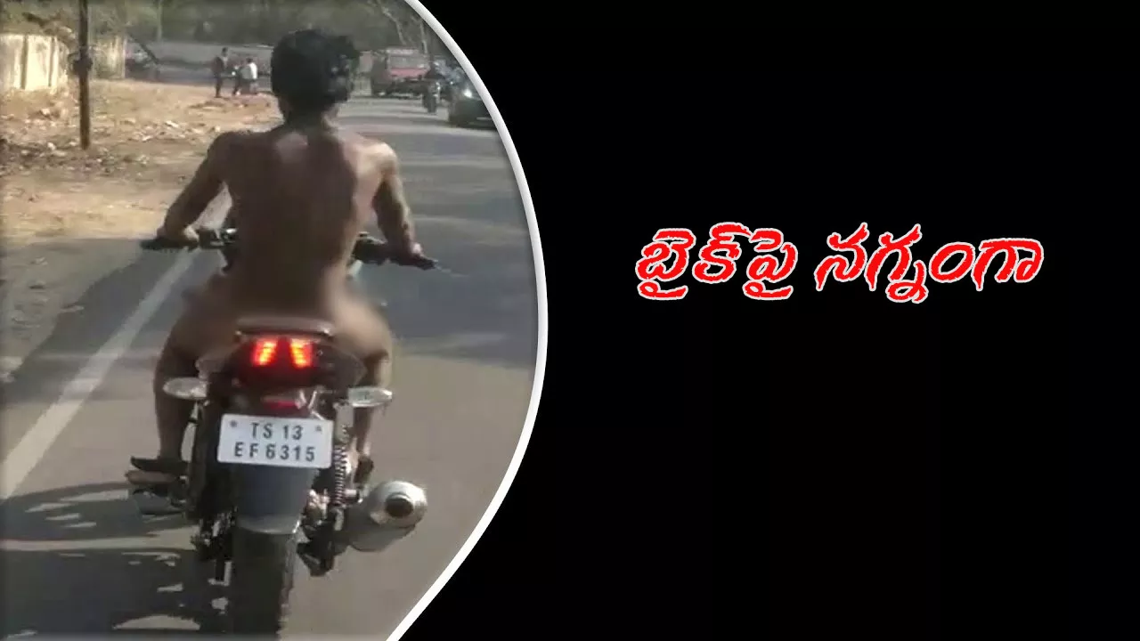 A bike rider Halchal in Hyderbad public roads police looking  - Sakshi