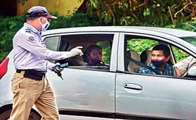 Masks mandatory even while driving alone Says Delhi High Court - Sakshi