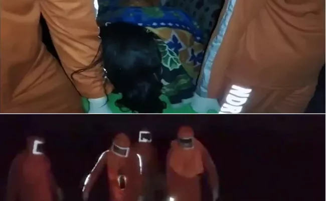 NDRF Rescues Mother And Child From Flooded Village In Odisha - Sakshi