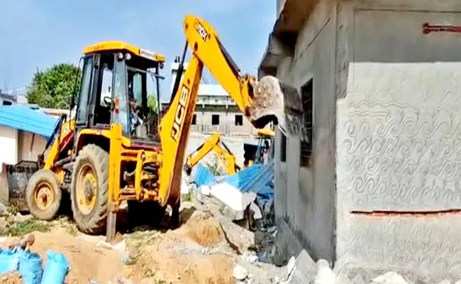 Officials Demolish Illegal Constructions In Chittoor District - Sakshi
