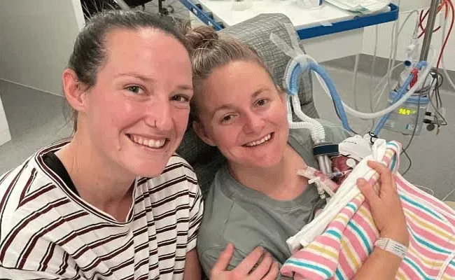 Megan Schutt And  Jess Holyoake Blessed With A Baby Girl - Sakshi