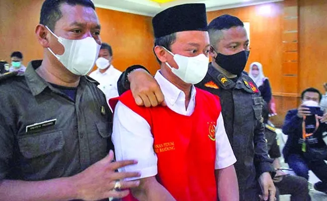 Indonesian Teacher Gets Life in Prison for Molestation 13 Students - Sakshi