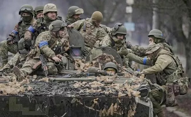Rape Fear From Russian Troops Ukraine Women Cut Hair - Sakshi
