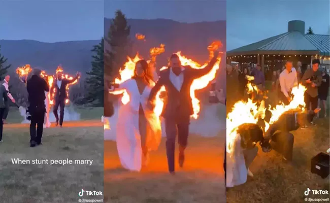 Viral video: Bride and groom set themselves on fire in wedding exit stunt, wow wedding guests - Sakshi