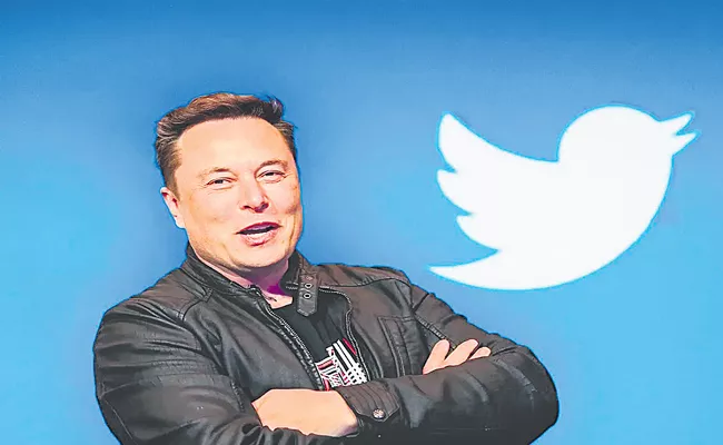 Elon Musk says on Twitter deal on hold - Sakshi