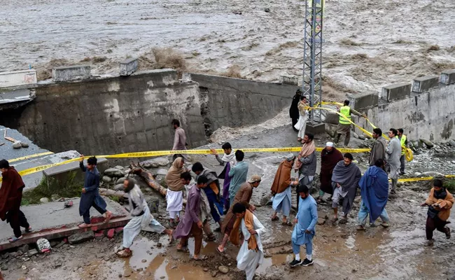 Pakistan Hits Floods Along With Political Crisis - Sakshi