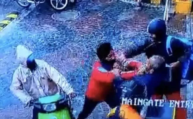Food Delivery Person Security Guard Arrested During Fight Each Other - Sakshi