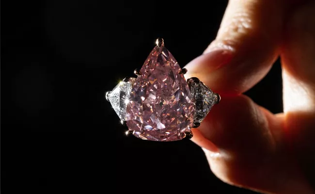 Extraordinary Fortune Pink diamond sold in Geneva For Millions - Sakshi