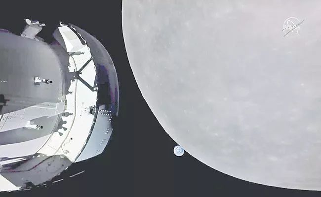 Nasa Orion capsule reaches moon on way to record-breaking lunar orbit - Sakshi