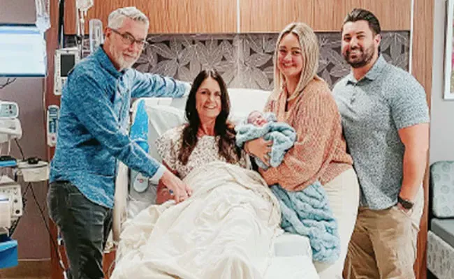 56 Year Old US Woman Gives Birth To Son And Daughter In Law Baby - Sakshi