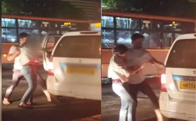 Video: Delhi Man Assaults Woman Pushes Into Cab On Busy Road - Sakshi