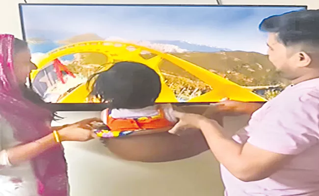 Baby Rides Virtual Roller Coaster - Sakshi
