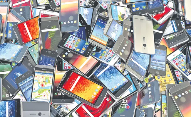 Mobile Phone Production Capacities Down by Upto 20 percent - Sakshi