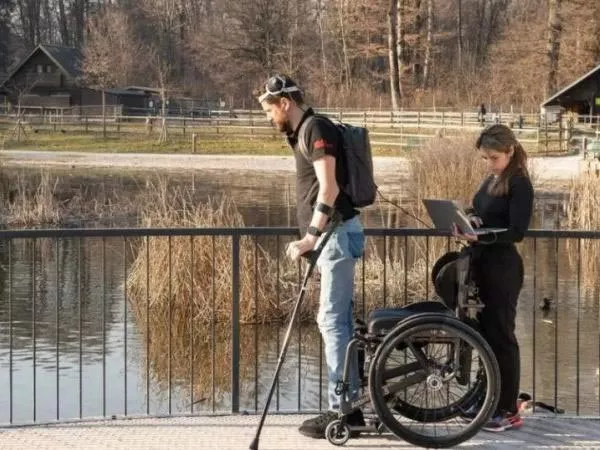 artificial intelligence helps paralysed man to walk - Sakshi