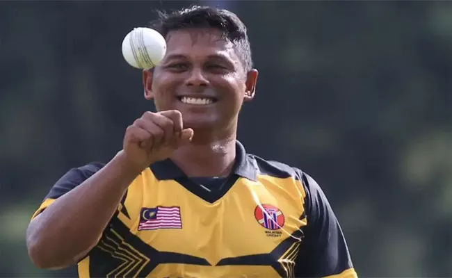 Malaysia Syazrul Idrus Produced Best Bowling Figures In Mens T20I History - Sakshi