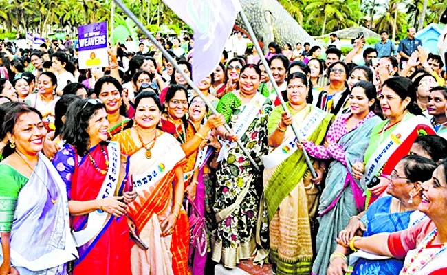 Women Participated in Saree Walkathon in Vizag - Sakshi
