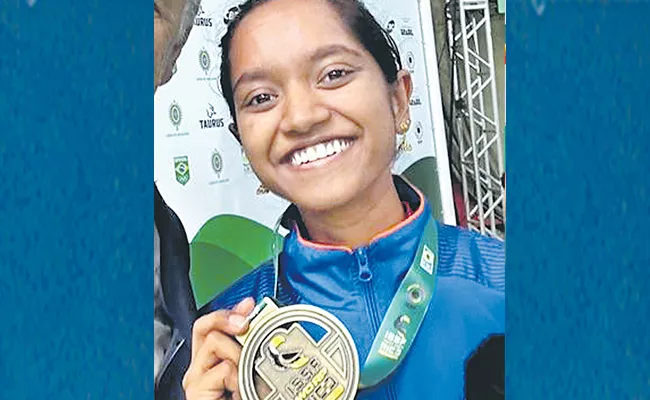 Indian shooter Elavenil Valarivan won gold - Sakshi