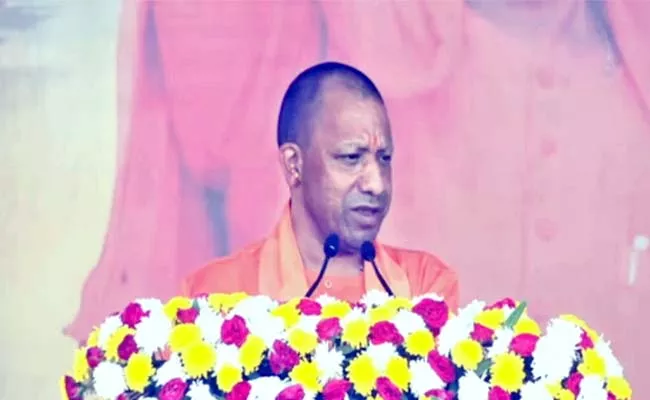 CM Yogi Adityanth Serious Comments Over KCR And MIM - Sakshi