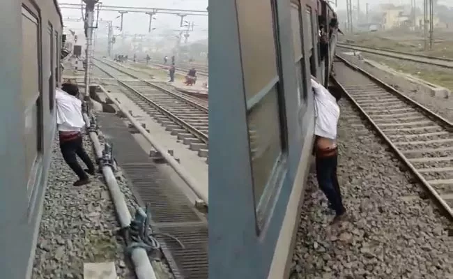Thief Dangles From Moving train window after Failed Robbery attempt - Sakshi