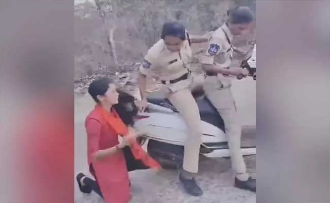Woman Constable Suspended Who Drag ABVP Student By Hair Hyderabad - Sakshi